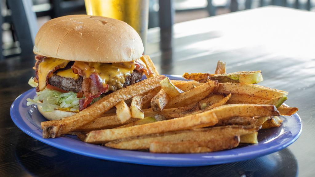 Bacon Burger · Consuming raw or undercooked meats, poultry, seafood, shellfish, or egg may increase your risk of foodborne illness, especially if you have certain medical conditions.

The famous Roo burger topped with applewood smoked bacon and cheddar cheese.