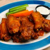 Buffalo Wings · Buffalo, BBQ, Guinness BBQ or Garlic Parmesan; served with bleu cheese, celery & carrots.