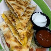 Spicy Chicken Quesadilla · Served with lettuce, tomatoes, salsa & sour cream.