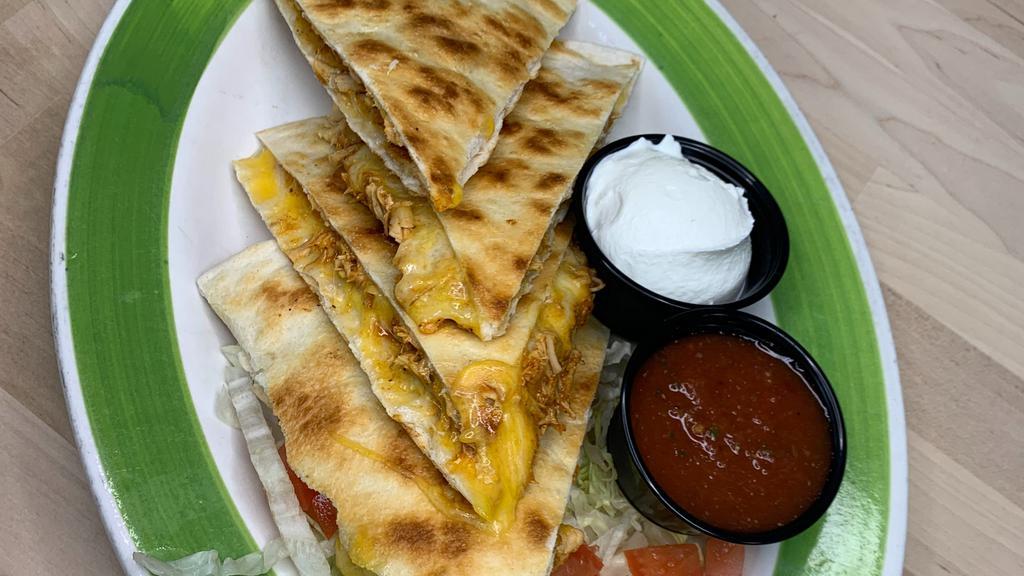 Spicy Chicken Quesadilla · Served with lettuce, tomatoes, salsa & sour cream.