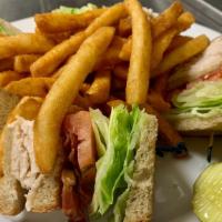 Club Thatcher · Grilled chicken or turkey, bacon, lettuce, tomatoes & mayo on toast.