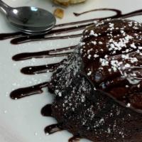 Chocolate Lava Cake · Warm chocolate cake with a gooey chocolate center 
served with vanilla or chocolate ice crea...