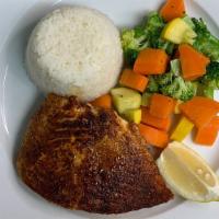 Fresh Atlantic Salmon · Choice of grilled plain, broiled in lemon butter sauce or blackened; served with rice & seas...