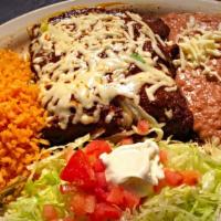 Ord Enchiladas · 3 corn tortilla rolled around a filling and covered with Your choice of sauce.