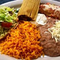 Combo Dinner · Combination plate includes, one taco, one enchilada and your choice of a tamale or quesadill...