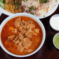Butter Chicken · Butter chicken, basmati rice, small salad and naan bread.