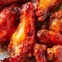 Wings · 8 Fried Wings with Fries Choice of: Buffalo, Lemon Pepper, Hot Lemon Pepper, Honey BBQ, Jerk...
