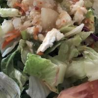 Greek Salad · Crisp mix romaine and iceberg lettuce, texas onion, green pepper, Roma tomatoes, shredded re...