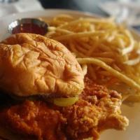 Nashville Hot Chicken Sandwich · Buttermilk Fried, Pickles, Jalapeno Aioli, Martin's Potato Roll