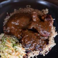 Jerk Chicken White · Two breasts, red beans and rice, steamed cabbage.