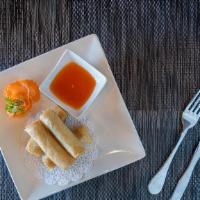 Spring Rolls · Homemade crispy rolls stuffed with cabbage, carrots, shiitake mushrooms, and cellophane nood...