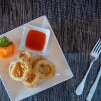 Fried Calamari · Deep-fried battered calamari rings served with sweet chili sauce