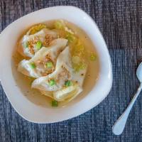 Wonton Soup · Fresh wontons stuffed with ground shrimp and pork in hot broth, topped with scallions and bl...