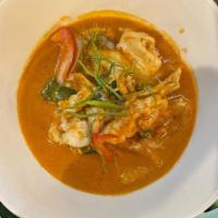 Panang Curry · Panang curry paste and coconut milk with lime leaves, bell peppers, and Thai basil. Served w...