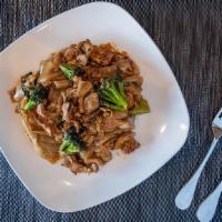 Pad See Ew · Flat rice noodles, Chinese broccoli, and eggs, stir-fried in sweet soy sauce