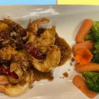 Duck & Shrimp Tamarind · Crispy roasted duck and shrimp, topped with Thai special tamarind sauce, served with steamed...