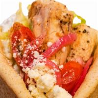 Chicken Souvlaki · Grilled chicken, lettuce, feta, marinated cherry tomato and red onion, with cucumber tzatzik...