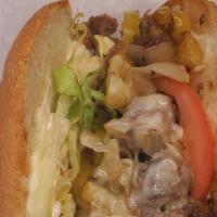 Steak & Cheese · Seasoned Philly steak, grilled with marinated onions and banana peppers. Provolone, lettuce,...
