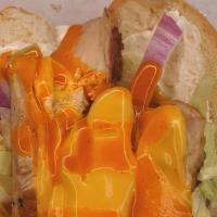 Buffalo Chicken · Crispy chicken tossed in spicy Buffalo sauce, melted cheddar jack, lettuce, red onion, ranch.