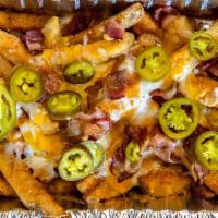 Deli Cheese Fries · Thick-cut fries smothered in cheddar jack cheese, topped with jalapeños and smoked bacon. Si...