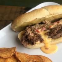 901 Cheese Steak Sandwich · Certified Angus sirloin, sautéed onions, pepper Jack cheese, and pimento cheese sauce on a t...