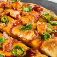 Bbq Chicken Pizza · BBQ sauce, mozzarella, chicken, red onions, sliced jalapeño, and cilantro. (serves 2)