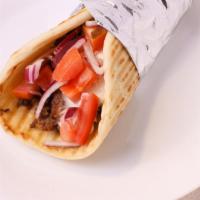 Gyro Wrap · Gyro meat with tomato, red onions, and taziki sauce, wrapped in greek style pita