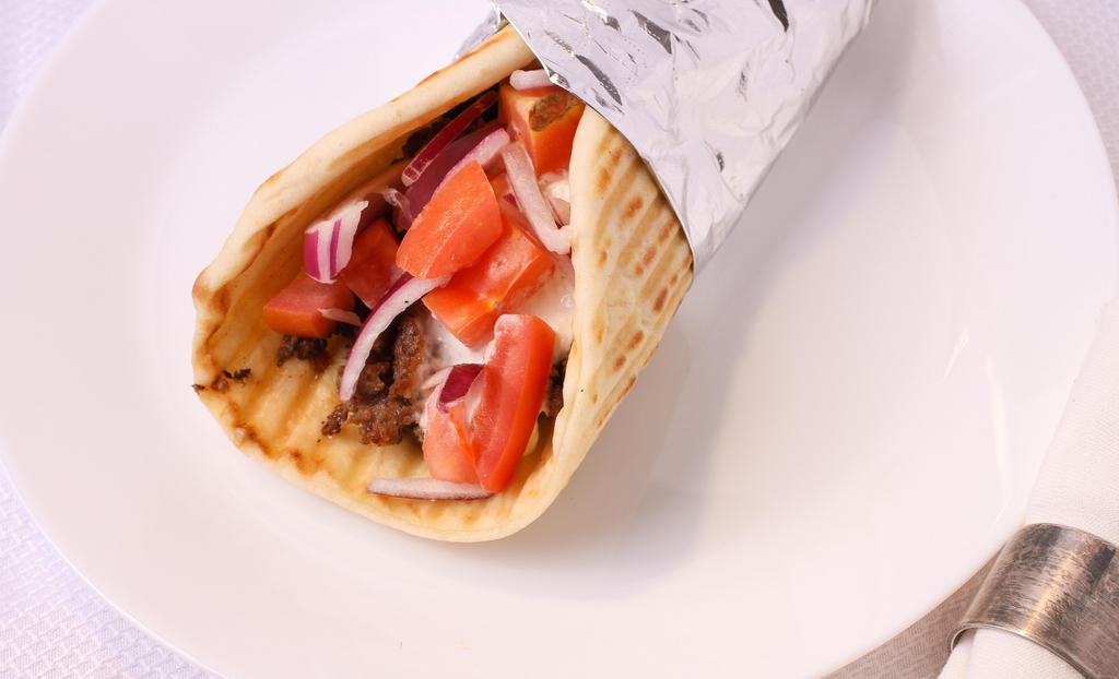 Gyro Wrap · Gyro meat with tomato, red onions, and taziki sauce, wrapped in greek style pita