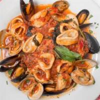 Seafood Della Nonna · Shrimp, mussels, clams and calamari sautéed with marinara over linguine pasta.