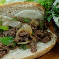 Apollo Creed Steak And Cheese · Hot. Philly steak, roasted green peppers, caramelized onions and melted provolone baked on a...