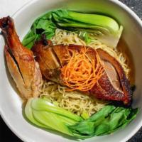 Duck Noodle Soup · Egg noodles with sliced roasted duck, baby bok choy, beansprouts, green onions, cilantro, an...