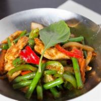 Green Beans (Pad Prik Khing) · Fresh green beans and bell peppers stir-fried with Prik Khing curry paste and kaffir lime le...