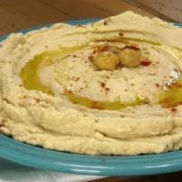 Original Hummus · Pureed chickpeas with olive oil. Served with pita.