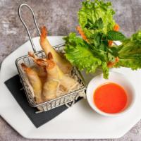 Crispy Shrimp Roll · Shrimp wrap with wonton skin, garlic, cilantro, served with sweet and sour sauce.