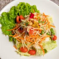 Papaya Salad (Som Tom) · Shredded green papaya, carrot, tomato, green bean mixed with thai chili, lime juice, garlic ...