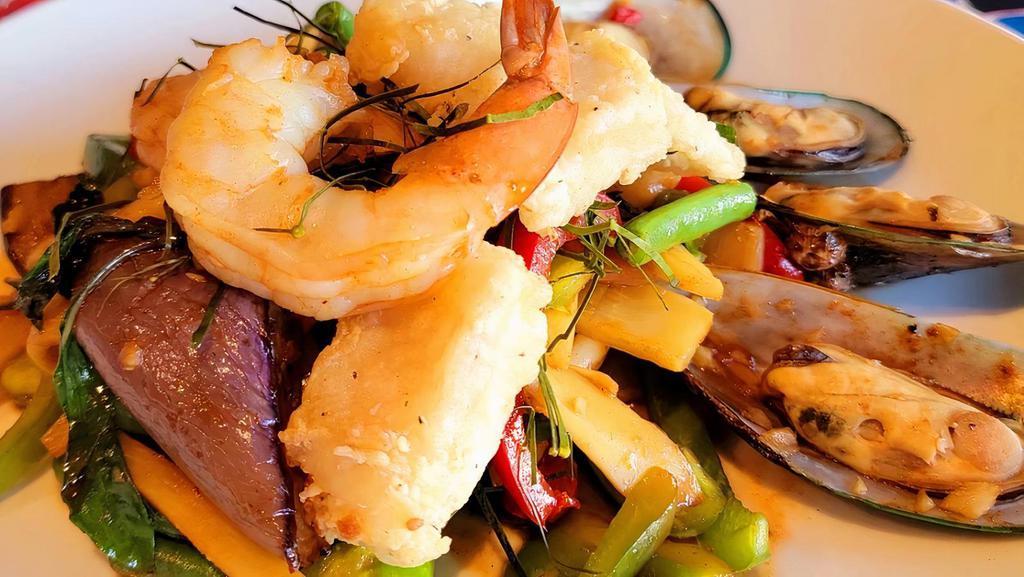 Ocean Seafood · Calamari, shrimp, scallops, mussels, fish, carrot, onion, mushroom, bell pepper, thai basil with our special sauce.