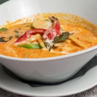 Red Curry · Coconut milk, bamboo, sweet thai basil and bell pepper in red curry sauce.