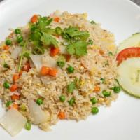 Thai Fried Rice · Stir fried rice with egg, pea, carrot and onion.