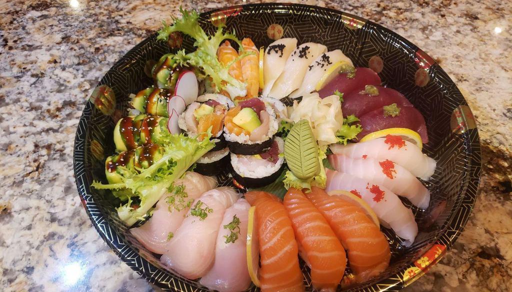 Sushi Tray $53 · 18 Pieces Chief’s Special Sushi Seletion
1* Green Dragon
1* Triple Colors Roll (Tuna,white Fish, Salmon and Avocado)