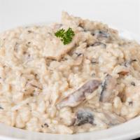 Chicken Portobello Risotto · Italian rice with slices of chicken breast and portobello mushrooms served in a cream sauce ...