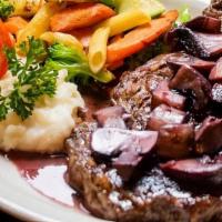 Ribeye Steak · 8oz Ribeye with portobello mushrooms in a red wine demi-glazed sauce or with devil marinara ...