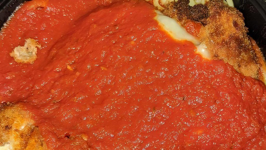 Chicken Parm Pizza · Chunks of Chicken Parm, tomato sauce, Mozzarella