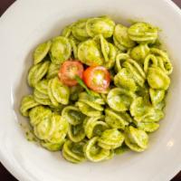 Besto Pesto · Penne pasta, basil pesto with pine nuts and Parmesan, touch of cream, topped with grilled ch...
