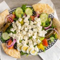 Our Famous Greek Salad · Feta cheese, black olives, fresh tomatoes, cucumbers, green peppers, onions, romaine lettuce...