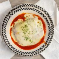 Chicken Parmigiana · Served with one side.