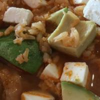 Caldo Tlalpeño · One of Mexico city's favorites, shredded chicken breast with slices of avocado, chunks of qu...