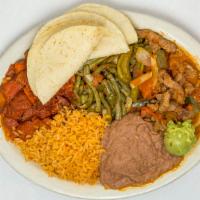 Mucho Mexico · Slices of fajita, one enchilada, served with guacamole, pico de gallo and rice.