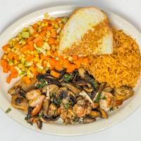 Filete Marinera · Grilled fish filet topped with shrimp, crab fingers, and mushrooms, served with Mexican rice...