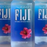 Fiji Water (500Ml) · Bottled at the source, untouched by man... until you unscrew the cap anyways ;)