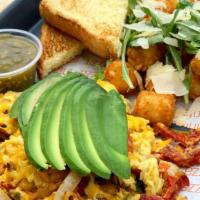 Veggie Scramble · Three eggs, onions, Cheddar cheese, charred serrano peppers, sun-dried tomatoes, thick-cut T...